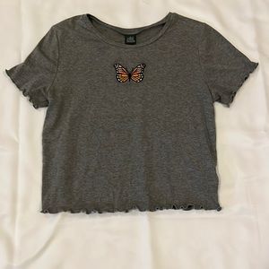 size xl fits like a medium, gray with orange ish butterfly